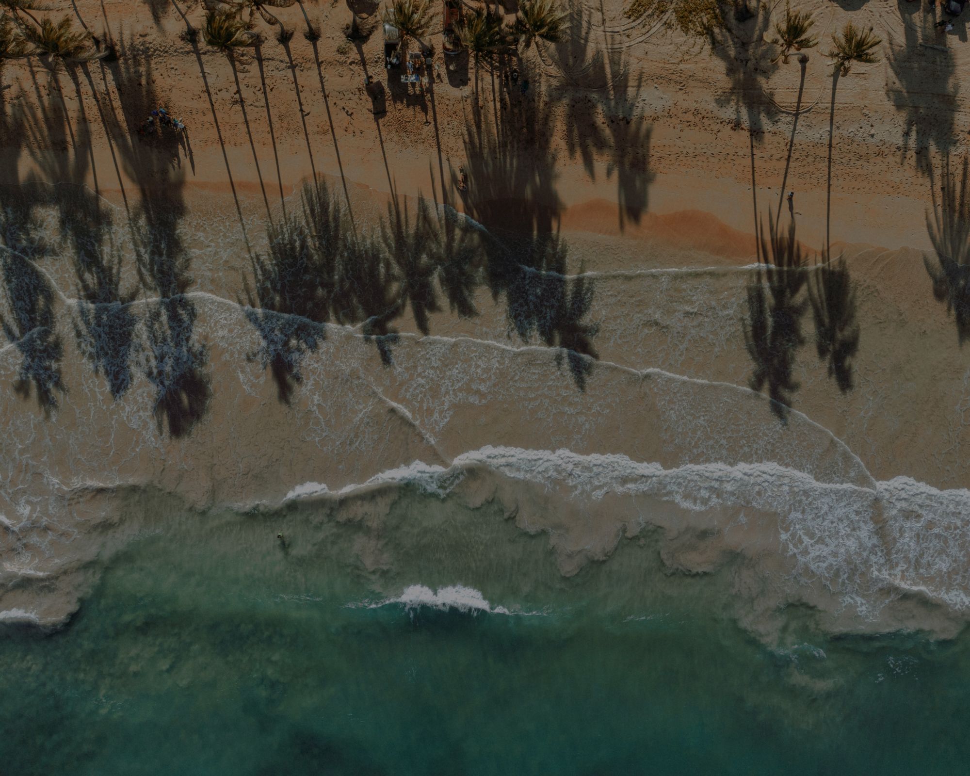 White‑sand shoreline and calm turquoise water Dominican Republic